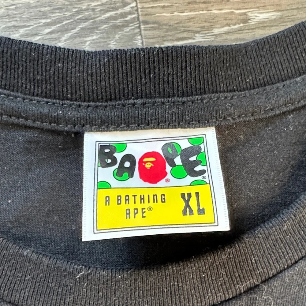 BAPE 1st Camo By Bathing Tee
'Black/Olive' size XL - Picture 2 of 6